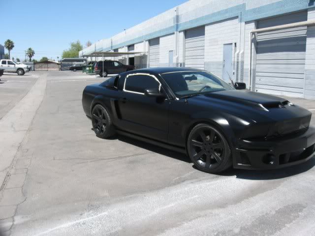 my roommate just got his mustang painted flat black